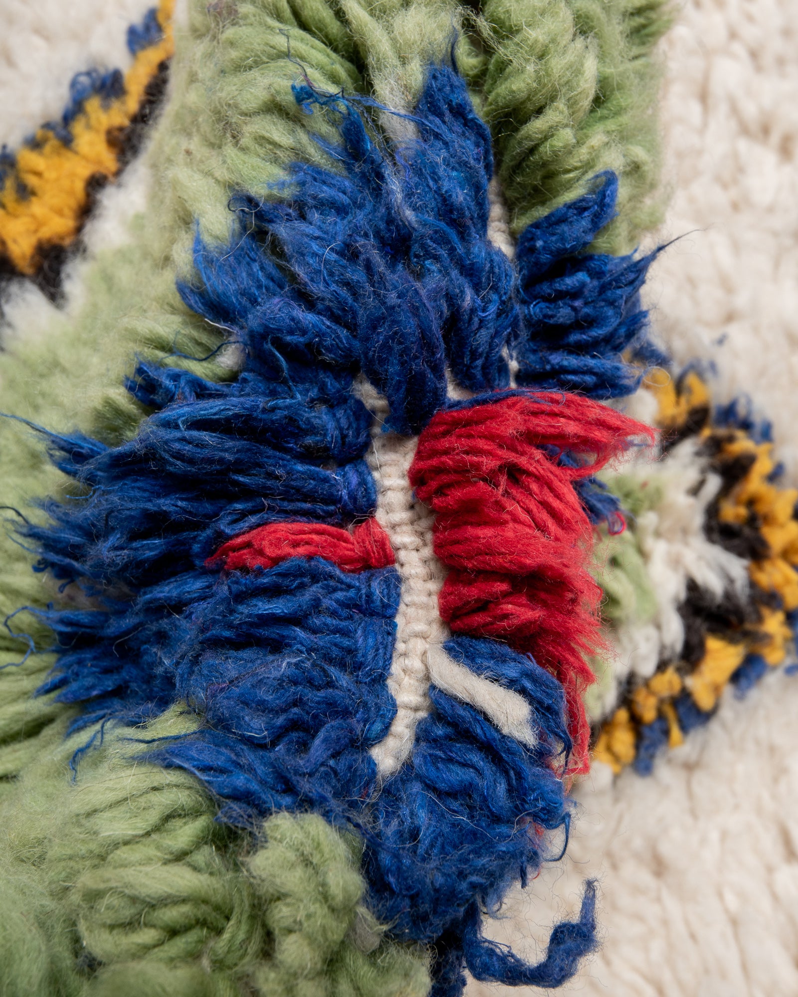 Modern, designer, handcrafted Berber rug from Morocco. Beniourain carpet with beautiful colours and patterns and fluffy wool texture.